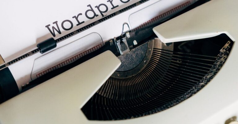 Close-up of a vintage typewriter with 'Wordpress' typed on paper, conveying a classic theme.